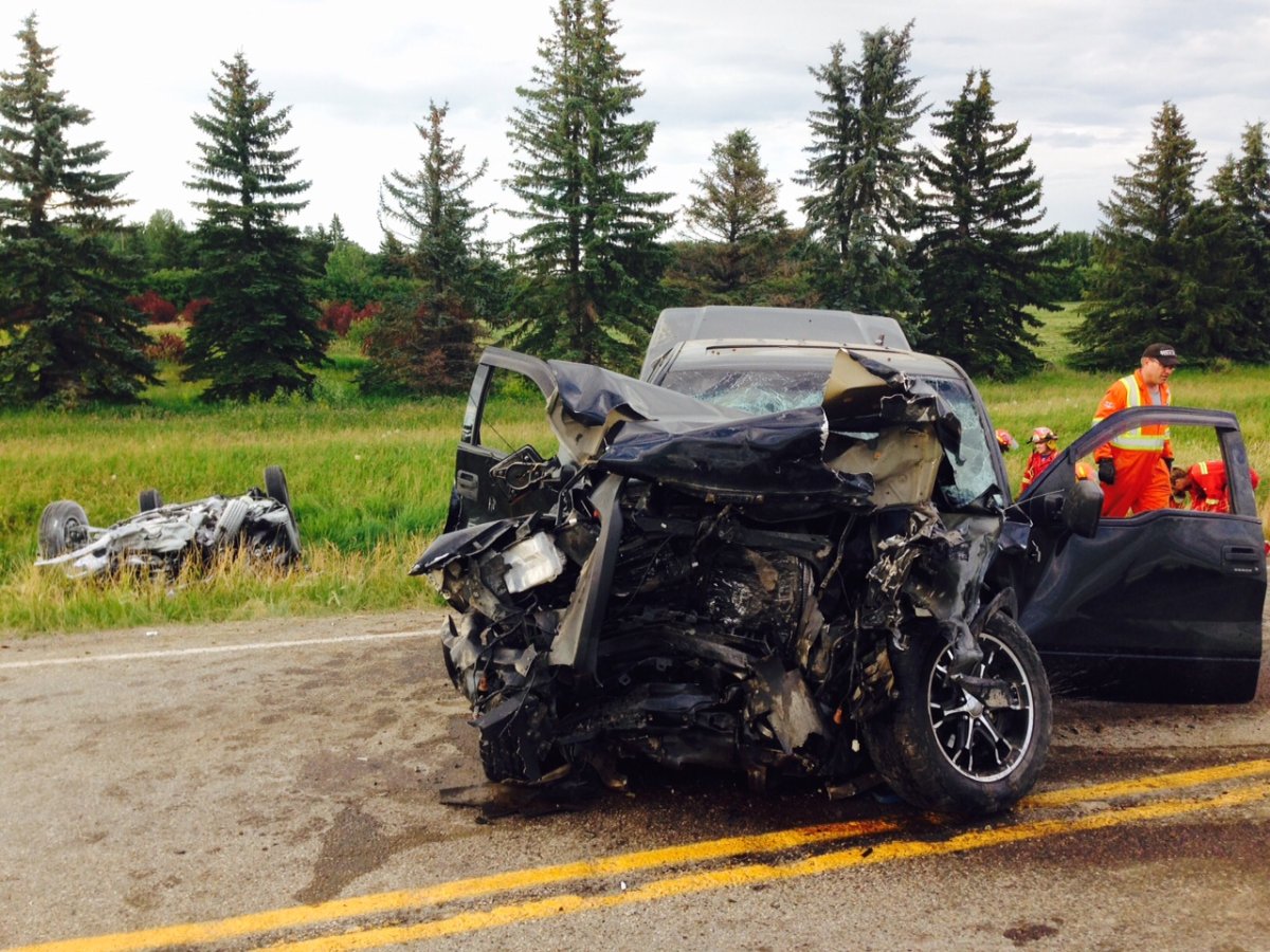 RCMP respond to a collision on Highway 587 on Sunday, July 19, 2015. 