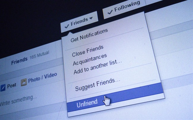 An "unfriend" option on a Facebook page is shown in Toronto, July 8, 2015. Friends and followers are amassed on social media sites at lightning speed compared to the typically gradual build of relationships forged offline. Yet for some, being "unfriended‚" can be bruising to the ego - even if the relationships aren't close.