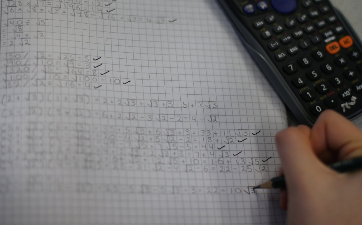 A student takes part in a maths lesson at a secondary school on December 1, 2014.
