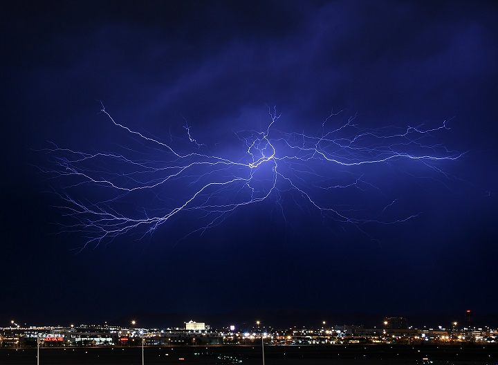 Lightning strikes during a thunderstorm on July 7, 2015 in Las Vegas, Nevada. The monsoon storm dropped heavy rain and hail in parts of the valley causing street flooding and power outages.