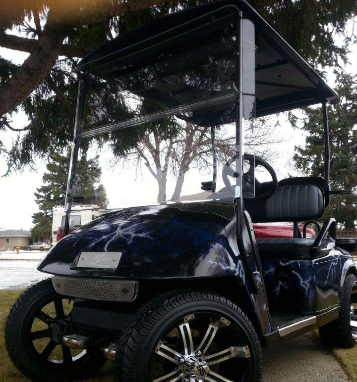 A customized golf cart made by Doug Williams.