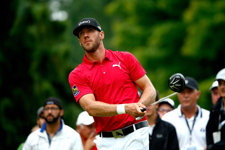 Graham DeLaet tees off on the third hole during the final round of the RBC Canadian Open at the Royal Montreal Golf Club on July 27, 2014 in Montreal, Quebec.