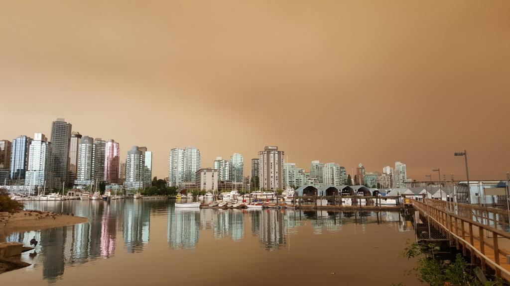 Residents across Metro Vancouver and other parts of B.C. woke to the sight of a strange haze in the sky Sunday morning.