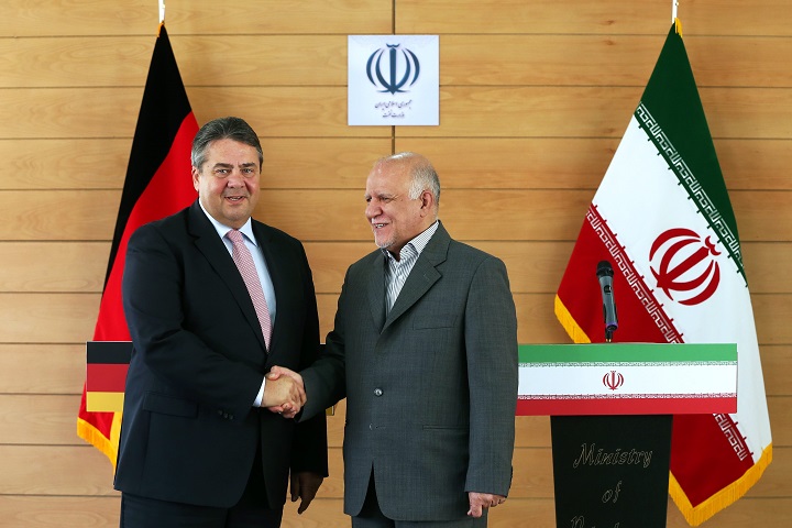 German Vice Chancellor and Economy Minister Sigmar Gabriel, left, shakes hands with Iranian Oil Minister Bijan Zanganeh in Tehran, Iran, Monday, July 20, 2015.