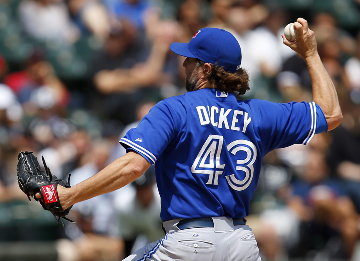 Toronto Blue Jays starting pitcher R.A. Dickey (43) delivers a pitch during the fifth inning of a baseball game against the Chicago White Sox in Chicago, on Thursday, July 9, 2015.