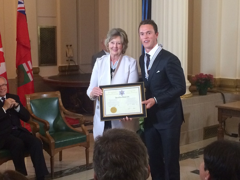Chicago Blackhawks captain, Jonathan Toews, receives the Order of Manitoba from Lt. Gov. Janice Filmon.
