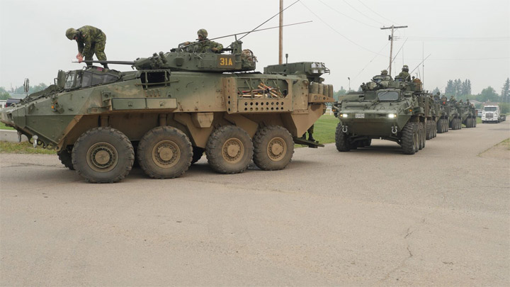 Canadian Forces troops getting ready to deploy from Prince Albert on July 7, 2015 to assist with fighting wildfires in northern Saskatchewan.