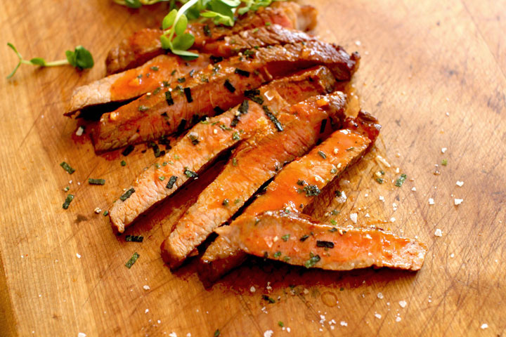 This June 22, 2015 photo shows rib eye steak with gochujang butter and nori in Concord, N.H. This dish is from a recipe by Edward Lee.