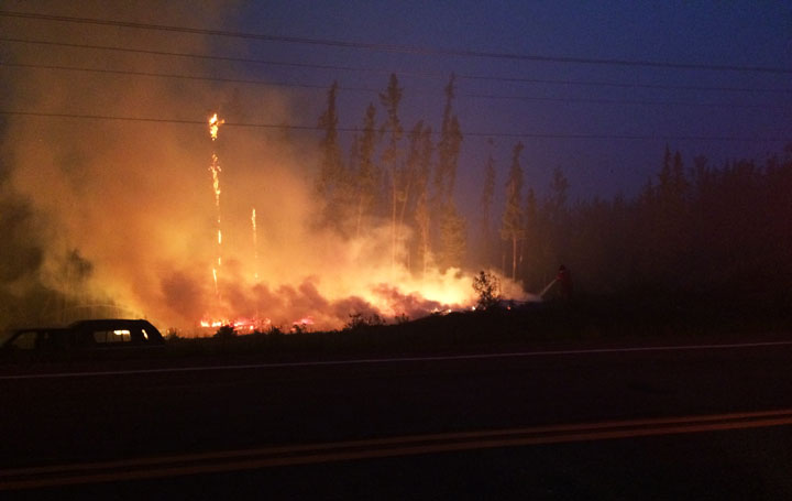 Saskatoon Fire Department send firefighters and equipment up north as wildfires encroach on Saskatchewan community.