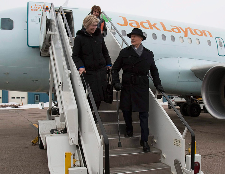 Jack Layton exits airplane