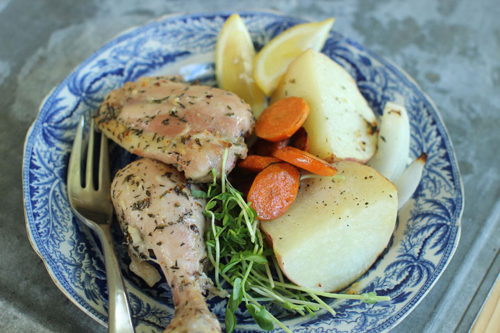 This June 22, 2015 photo shows weekend lemon chicken dinner in a bag in Concord, N.H. Chicken legs and thighs are luscious in texture and full of flavor and protein. They also are much lower in saturated fat than most cuts of red meat, and they offer more iron per serving than chicken breasts.