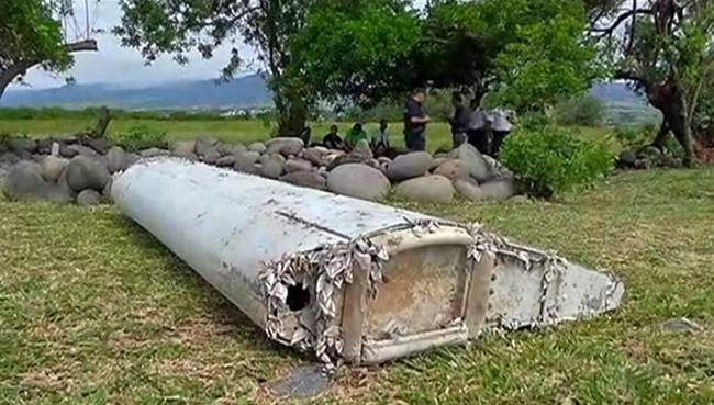 This image taken from video, shows a piece of debris from a plane, Wednesday, July 29, 2015, in Saint-Andre, Reunion.