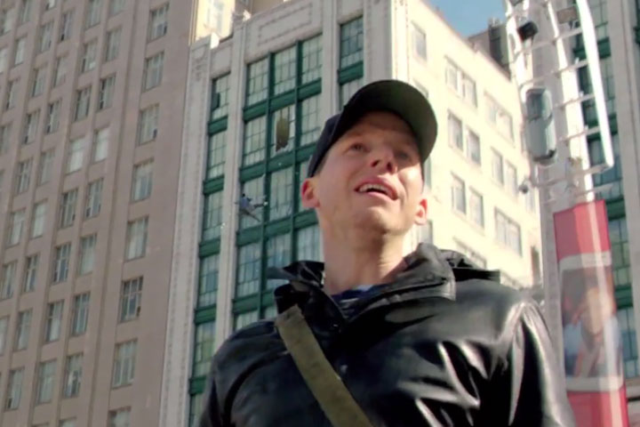 Stark Sands pictured in Toronto's Yonge-Dundas Square in a scene from the 'Minority Report' pilot.