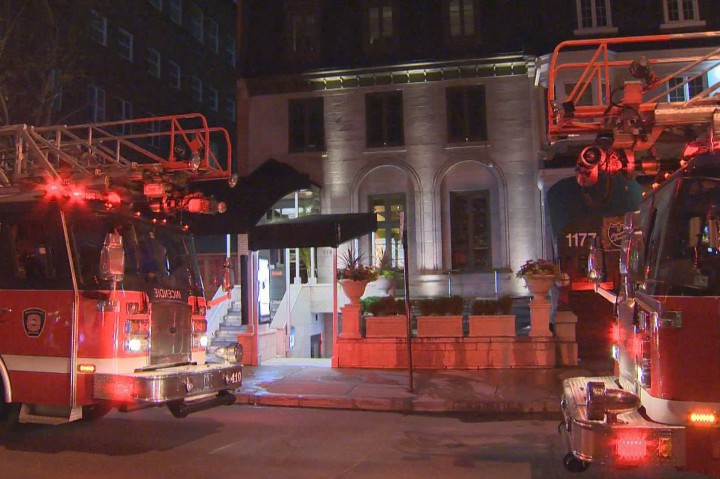 Police are searching for a suspect after a fire is started at the Queue de Cheval restaurant in Montreal, Wednesday, July 15, 2015.