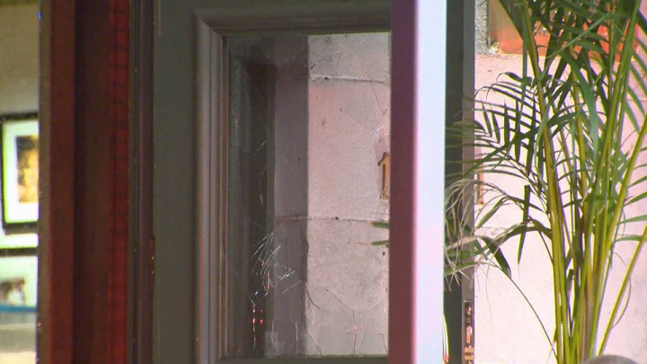 A suspect threw a molotov cocktail through the front window of the Queue de Cheval restaurant in Montreal, Wednesday, July 15, 2015.