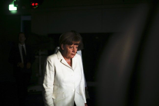 German Chancellor Angela Merkel arrives for an interview at the TV studios of German public broadcaster ARD in Berlin, Germany, Sunday, July 19, 2015.