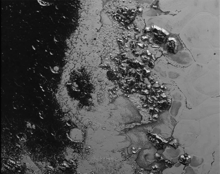 A mountain range in the southwestern margin of Pluto's Tombaugh Regio imaged by New Horizons.
