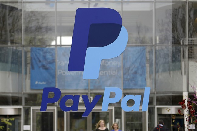 This March 10, 2015 photo shows signage outside PayPal headquarters in San Jose, Calif.