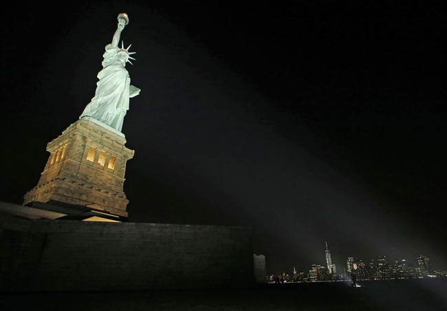 New light-emitting diodes or LEDs illuminate the Statue of Liberty on Liberty Island after the new system was turned on in New York, Tuesday, July 7, 2015. The system comes from Musco Lighting of Oskaloosa, Iowa. Musco systems are also in place at the Washington Monument, the White House and the Flight 93 National Memorial. 