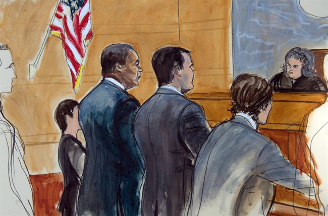 In this courtroom drawing, former FIFA official Jeffrey Webb, left, appears before United States Magistrate Judge Vera M. Scanlon, right, for arraignment on racketeering and bribery charges, Saturday, July 18, 2015, in New York.