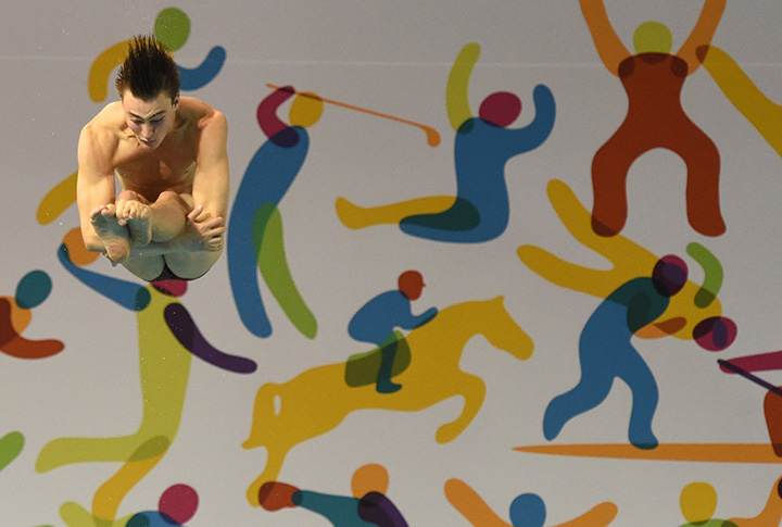 Phillippe Gagne of Canada dives during the men’s 3m springboard semi-finals at the Toronto 2015 Pan American Games, July 10, 2015.
