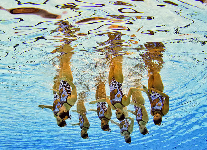 Mexican synchronized swimmers compete during the team technical routine at the 2015 Pan American Games in Toronto on July 9, 2015.