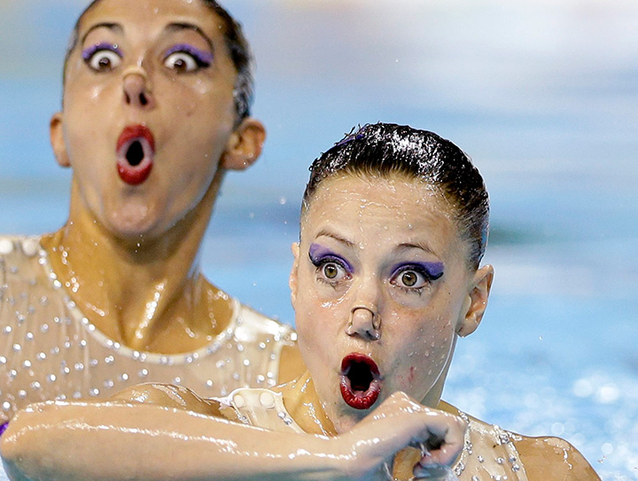 Members of Argentina's synchronized swimming team perform during technical routine competition for the Pan Am Games in Toronto on July 9, 2015. 