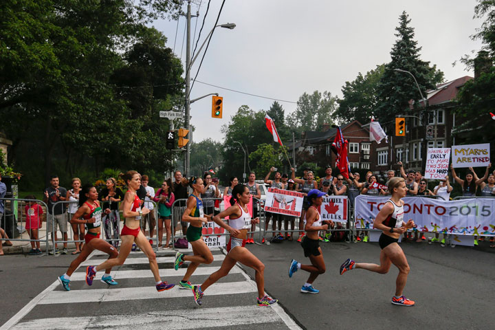 Athletes run during the women's marathon at the Pan Am Games in Toronto, Ontario, Saturday, July 18, 2015.
