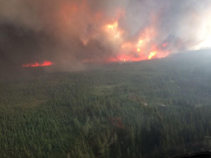 A wildfire burns 36 kilometres northeast of Peerless Lake.