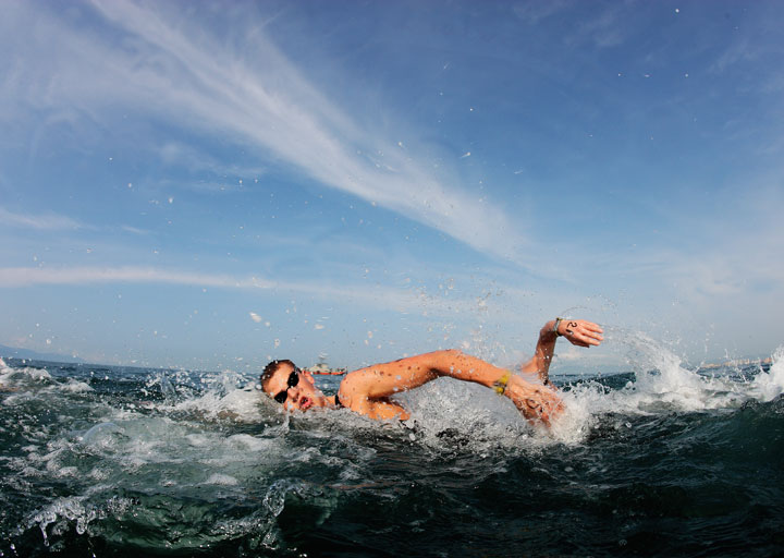 Canada's Richard Weinberger swims during the 10k Open Water Final at Malecon Beach on October 22, 2011 in Puerto Vallarta, Mexico. Weinberger went on to win the Gold Medal.
