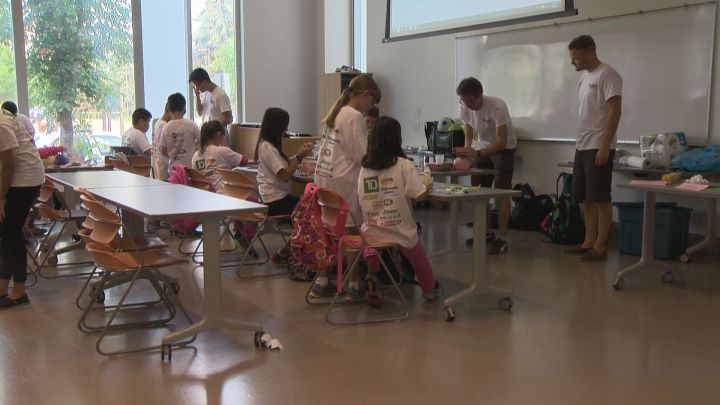Kids attend the "Rockin' Docs" camp at the University of Alberta Wednesday, July 29, 2015.