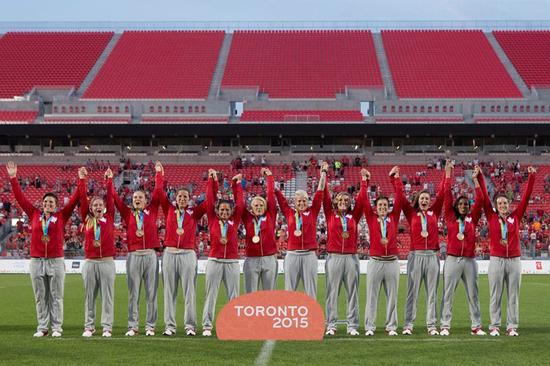 Canada's womens rugby sevens team celebrate with their gold medals after beating USA 55-7 at the Pan Am Games in Toronto on Sunday, July 12, 2015. 
