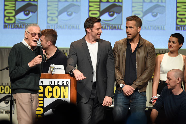 Stan Lee, left, pictured at Comic Con on July 11, 2015 with Hugh Jackman and Ryan Reynolds.