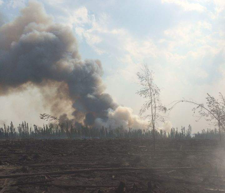 FILE: A wildfire burns in the Slave Lake area Tuesday, June 30, 2015.