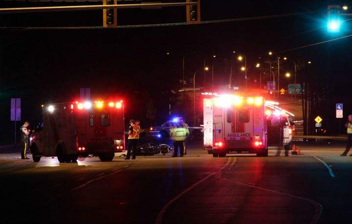 A sedan struck a motorcycle in Surrey last night, killing the male rider and seriously injring his female passenger.