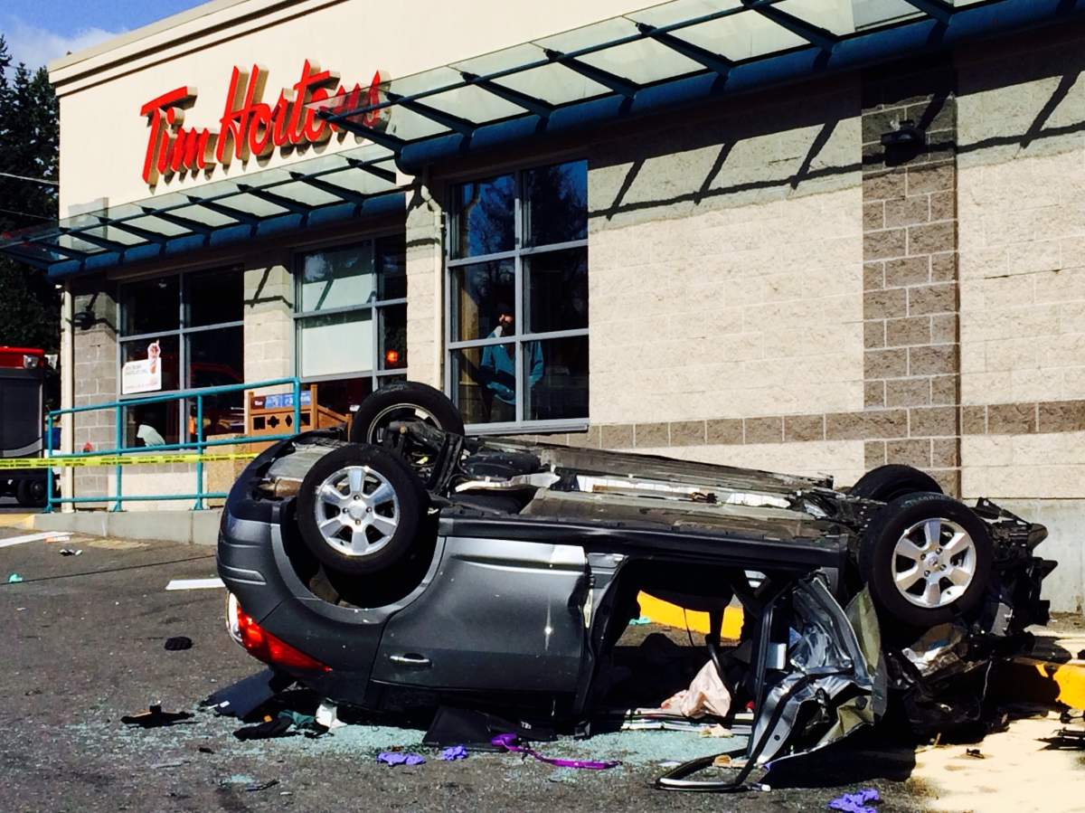 Elderly man crashes SUV into a Tim Horton's .