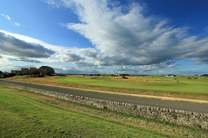 The road and wall behind the green on the 495 yards par 4, 17th hole 'Road' on the Old Course at St Andrews venue for The Open Championship in 2015, on July 29, 2014 in St Andrews, Scotland.