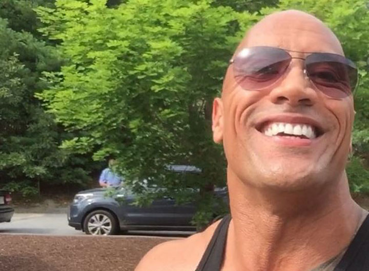 The Rock supposedly smiling through his pain. 