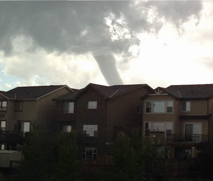 Photo of a funnel cloud near Aspen Woods Calgary.