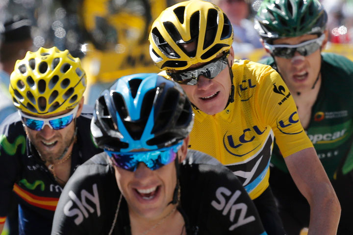 Spain's Alejandro Valverde, Australia's Richie Porte, Britain's Chris Froome, wearing the overall leader's yellow jersey, and Pierre Rolland of France, from left to right, climb during the twentieth stage of the Tour de France.