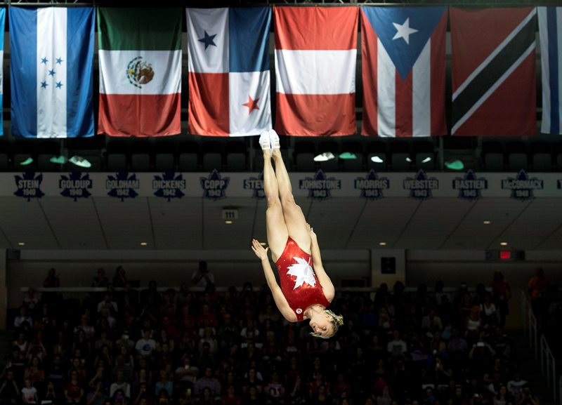 Rosannagh MacLennan, of Canada, performs on her way to winning the gold medal during trampoline finals at the Pan Am Games in Toronto on Sunday, July 19, 2015. 