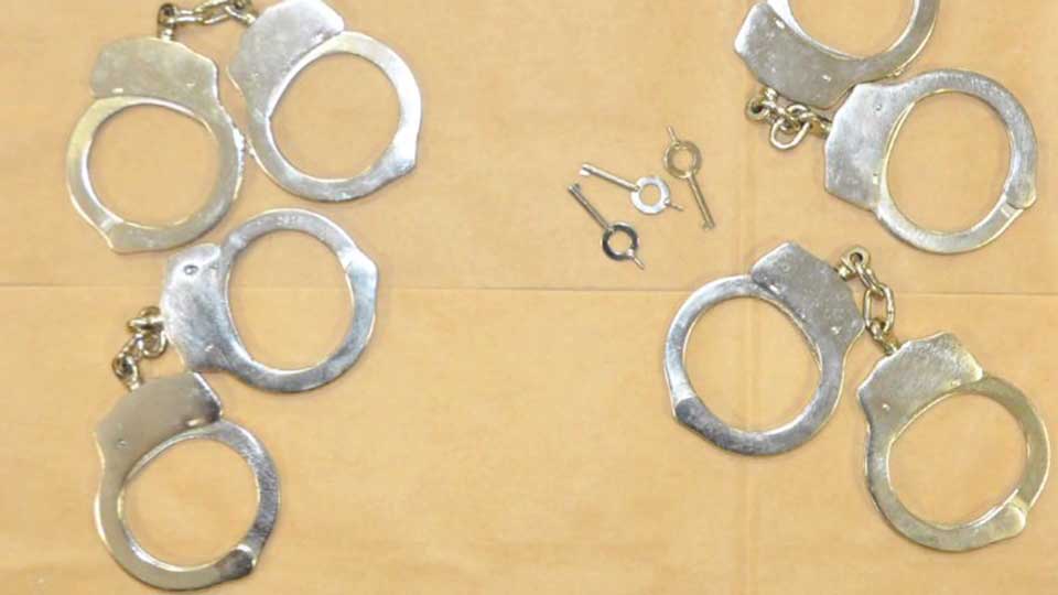 Handcuffs found in Neal Falls' pockets at the time of his death
