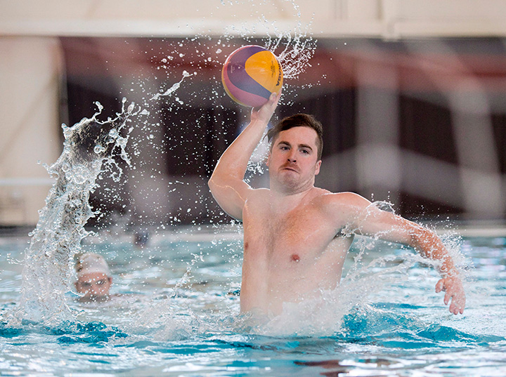 John Conway of the Canadian men's water polo team shoots during practice in Toronto on Wednesday January 28, 2015. 