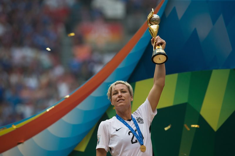 United States’ Abby Wambach hoists the trophy after defeating Japan to win the FIFA Women’sWorld Cup final soccer game in Vancouver, B.C., on Sunday July 5, 2015.