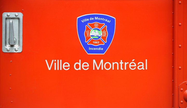 The logo of the Montreal Fire Department on a firefighter truck.