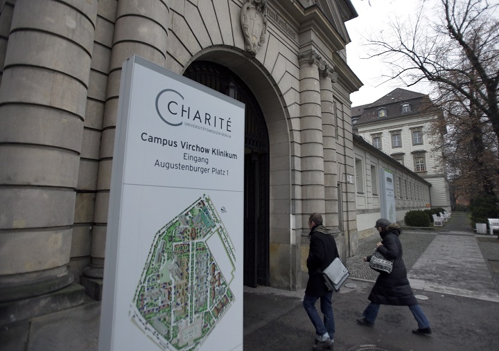 People enter the main entrance of the Charite Virchow hospital in Berlin, Germany, Thursday, Dec. 20, 2012.  (AP Photo/Michael Sohn).