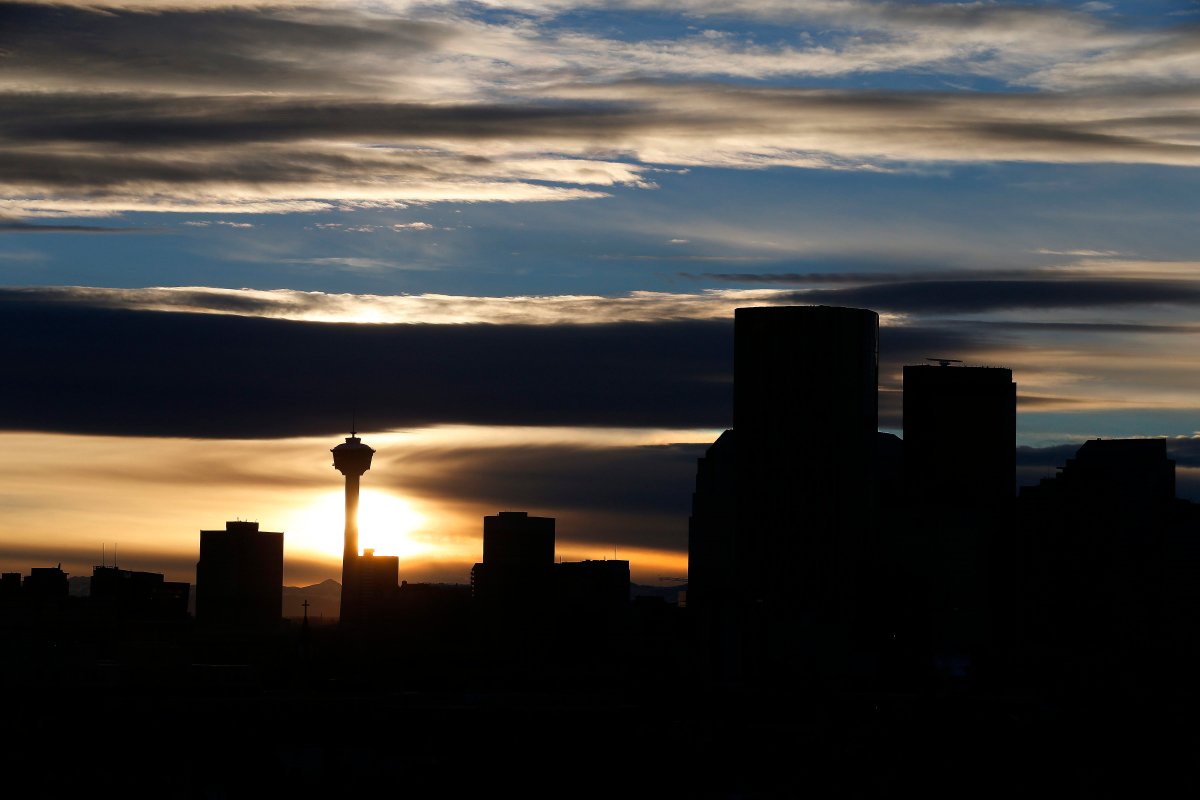 The Calgary Tower and downtown city skyline at sunset in Calgary, Alberta.