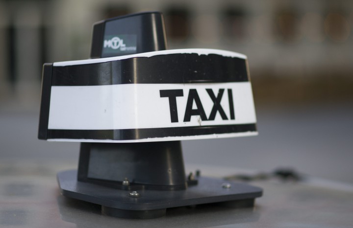 A taxi is shown in Montreal, Wednesday, May 13, 2015.