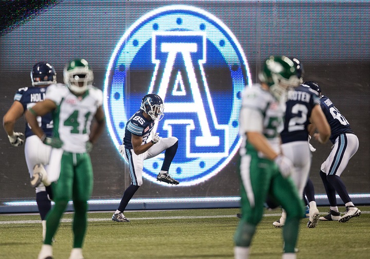 Toronto Argonauts' receiver Diontae Spencer celebrates his winning touchdown in the 4th quarter of their CFL game against the Saskatchewan Roughriders in Toronto Ontario, Saturday,  August 8, 2015.  (CFL PHOTO - Geoff Robins).