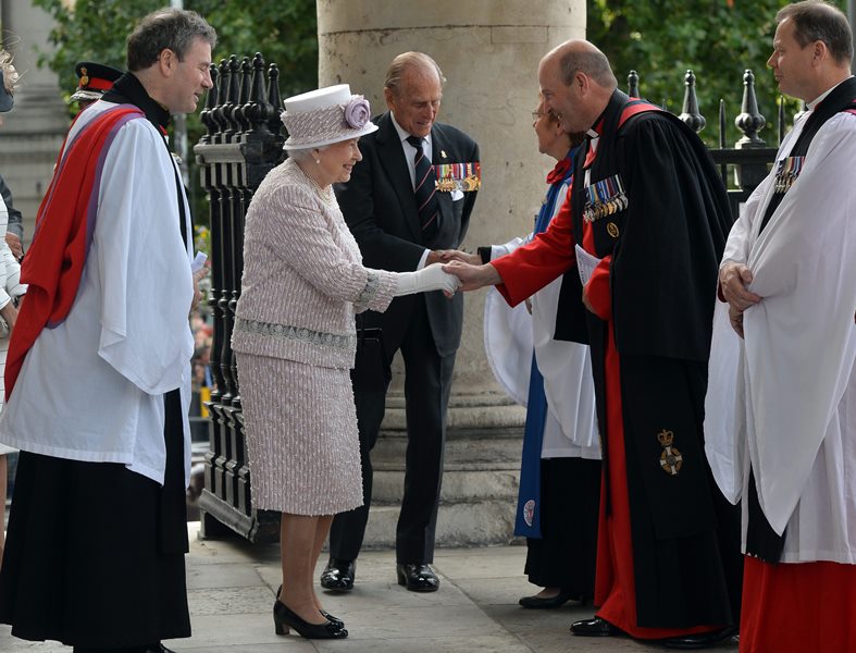 Britain's Queen Elizabeth II, centre and Philip, the Duke of Edinburgh arrive at St Martin-in-the-Fields, in London for a service of commemoration marking the 70th anniversary of VJ Day, Saturday Aug. 15, 2015.